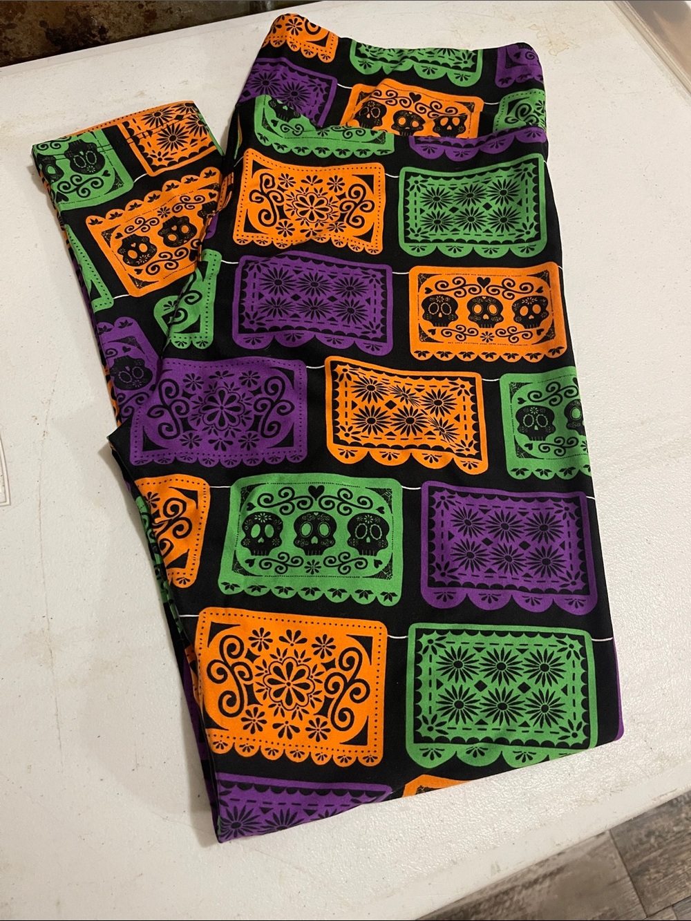 LuLaRoe TC Black Leggings with Orange, Green & Purple Fay of the Dead Print BNWO